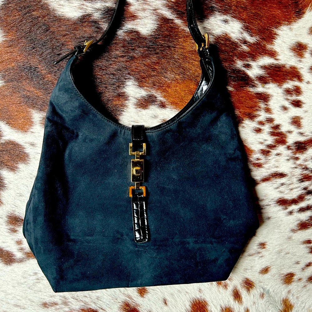 Black suede and faux leather bag. Mondani